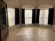 Living Room with bay window, neutral walls, and tile flooring at 9111 Woodbridge Oak Ter, Orlando, FL 32825