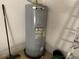 Large water heater located in the garage at 9111 Woodbridge Oak Ter, Orlando, FL 32825