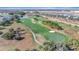 Aerial view of a lush green golf course at 9736 Heron Pointe Dr, Orlando, FL 32832