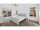 Spacious bedroom with a large bed and access to a balcony at 100 Palermo St, Davenport, FL 33897
