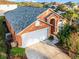 Stunning aerial view of a single-Gathering home with a new roof and two-car garage at 167 Castaway Beach Way, Kissimmee, FL 34746