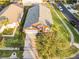 An aerial view of a home with a driveway and front lawn at 167 Castaway Beach Way, Kissimmee, FL 34746