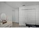 Bright bedroom with large closet, keyboard, and vanity mirror at 167 Castaway Beach Way, Kissimmee, FL 34746