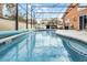Private screened-in pool with a patio area at 167 Castaway Beach Way, Kissimmee, FL 34746