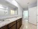 Double vanity bathroom with granite countertop at 3290 Logan Berry Dr, Mount Dora, FL 32757