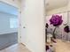 Bathroom with toilet and shower with floral shower curtain at 3290 Logan Berry Dr, Mount Dora, FL 32757