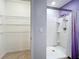 Bathroom with shower and ample shelving at 3290 Logan Berry Dr, Mount Dora, FL 32757