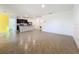 Open kitchen with island and stainless steel appliances at 3290 Logan Berry Dr, Mount Dora, FL 32757