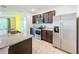 Modern kitchen with stainless steel appliances and granite countertops at 3290 Logan Berry Dr, Mount Dora, FL 32757