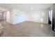 Bright living room featuring tile floors and an archway at 3290 Logan Berry Dr, Mount Dora, FL 32757