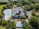 Resort pool, shuffleboard courts, and clubhouse at 411 Lucaya Loop # 411, Davenport, FL 33897