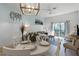 Bright dining area with a round table and white chairs at 411 Lucaya Loop # 411, Davenport, FL 33897