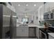 Modern kitchen with stainless steel appliances at 411 Lucaya Loop # 411, Davenport, FL 33897