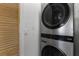 Laundry room with a stackable LG washer and dryer at 411 Lucaya Loop # 411, Davenport, FL 33897