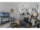 Open concept living area with kitchen and dining space at 411 Lucaya Loop # 411, Davenport, FL 33897