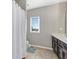 Bathroom with shower/tub combo and double vanity at 4700 Nathan Hale Blvd, St Cloud, FL 34769