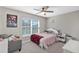 Bedroom with double bed, ceiling fan, and plush carpet at 4700 Nathan Hale Blvd, St Cloud, FL 34769