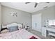 Bedroom with double bed, desk, and ceiling fan at 4700 Nathan Hale Blvd, St Cloud, FL 34769