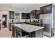 Modern kitchen with stainless steel appliances and granite countertops at 4700 Nathan Hale Blvd, Saint Cloud, FL 34769
