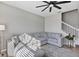 Spacious living room with sectional sofa and access to upstairs at 4700 Nathan Hale Blvd, St Cloud, FL 34769
