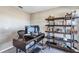 Home office with standing desk, monitor and storage at 4700 Nathan Hale Blvd, Saint Cloud, FL 34769