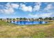 Serene pond with water fountain and green space at 4700 Nathan Hale Blvd, St Cloud, FL 34769