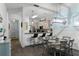 Modern kitchen with white cabinets, granite countertops, and a breakfast bar at 608 Gran Bahama Blvd # 608, Davenport, FL 33897