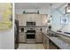 Updated kitchen featuring stainless steel appliances and granite countertops at 608 Gran Bahama Blvd # 608, Davenport, FL 33897