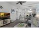 Open concept living and dining area with a view to the kitchen at 608 Gran Bahama Blvd # 608, Davenport, FL 33897
