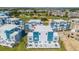 Aerial view showcasing a modern townhouse with private balconies at 7740 Sandy Ridge Dr # 9-236, Kissimmee, FL 34747