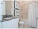 Modern bathroom with a tub, shower, and vanity at 7740 Sandy Ridge Dr # 9-236, Kissimmee, FL 34747