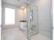 Updated bathroom with a walk-in shower and vanity at 7740 Sandy Ridge Dr # 9-236, Kissimmee, FL 34747