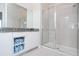 Modern bathroom with a large walk-in shower and stylish vanity at 7740 Sandy Ridge Dr # 9-236, Kissimmee, FL 34747