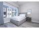 Bedroom with a full-size bed and a window with a view at 7740 Sandy Ridge Dr # 9-236, Kissimmee, FL 34747