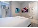 Comfortable bedroom with a queen bed, TV, and en-suite bathroom at 7740 Sandy Ridge Dr # 9-236, Kissimmee, FL 34747