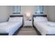 Bedroom with two twin-size beds and a nightstand at 7740 Sandy Ridge Dr # 9-236, Kissimmee, FL 34747
