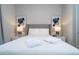 Bedroom with a queen-size bed and nightstands at 7740 Sandy Ridge Dr # 9-236, Kissimmee, FL 34747
