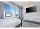 Bright bedroom with large window, plush bed, and modern dresser at 7740 Sandy Ridge Dr # 9-236, Kissimmee, FL 34747