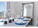 Elegant dining room with a large table and modern chairs at 7740 Sandy Ridge Dr # 9-236, Kissimmee, FL 34747