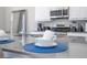 Kitchen counter with dishes and blue placemats at 7740 Sandy Ridge Dr # 9-236, Kissimmee, FL 34747