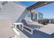 Relaxing rooftop deck with lounge chairs and outdoor furniture at 7740 Sandy Ridge Dr # 9-236, Kissimmee, FL 34747