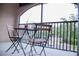 Balcony with table and chairs overlooking parking area at 940 Village Trl # 9-303, Port Orange, FL 32127