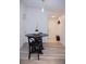 Dining area with a dark wood table and chairs, and wood-look flooring at 940 Village Trl # 9-303, Port Orange, FL 32127