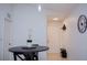 Dining area with a round table and entryway access at 940 Village Trl # 9-303, Port Orange, FL 32127