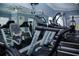 Close-up of treadmills and other exercise equipment in fitness center at 940 Village Trl # 9-303, Port Orange, FL 32127