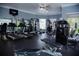 Fitness center with treadmills, weights, and other equipment at 940 Village Trl # 9-303, Port Orange, FL 32127