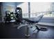 Fitness center with weight machines and benches at 940 Village Trl # 9-303, Port Orange, FL 32127