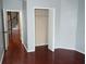 Bedroom with hardwood floors and closet with spiral staircase view at 102 Vista Verdi Cir # 336, Lake Mary, FL 32746