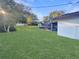 Expansive grassy backyard, offering ample space for recreation at 1038 Abadan Dr, Deltona, FL 32725