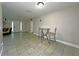 Bright and airy entryway with tile flooring, leading to living areas at 1048 Wakefield Cir, Deltona, FL 32725